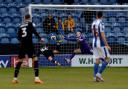 Ben Whitfield scores to put Barrow into the lead 0-1 during the Sky Bet League 2 match between Colchester United and Barrow at the Weston Homes Community Stadium, Colchester  Pictures: Richard Blaxall | MI News