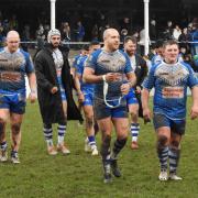 ONWARDS: Barrow Raiders players walk off the pitch after a recent contest with Coventry Bears