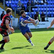 DAZZLING: Hakim Milouide on his way for a great try