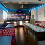 Upstairs features games and a bar