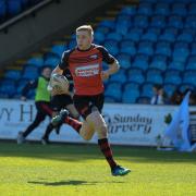 DEFIANCE: Jake Spedding races clear to score Barrow's first try