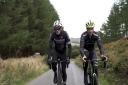 Phil Jones and James Golding are cycling the full Tour of Britain route to raise money for the future of the sport.