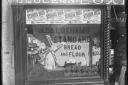 Loxhams shop window advertising Standard Bread and Flour in 1910