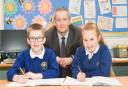 Vickerstown School Headteacher David Holmes with pupils Henry Doughty and Niamh Ottley.