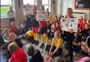 Pupils show off what they have learned about Belgium