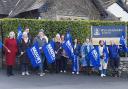The teachers on strike outside Windermere School