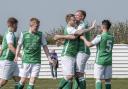Holker Old Boys celebrate Phil Coombe's goal Picture: Milton Haworth