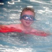 AFLOAT: Henry was one of the Stage One swimmers being given some of their first lessons