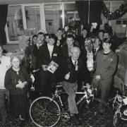 Retired Glaxo engineer Roy Crawford, front centre, receiving some of the renovated toys and bikes for the annual WRVS Christmas Appeal in 1994 from first year apprentices (Picture: T and J Photographic)