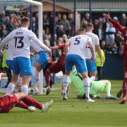 Ben Barclay (hidden behind Barrow no.5 Sam McClelland) puts Carlisle in front in the 15th minute. Picture: Richard Parkes