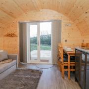 The open plan living area inside a Low Flan Farm pod