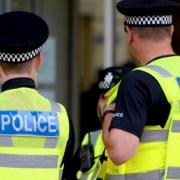 A woman has been arrested on suspicion of racially aggravated assault