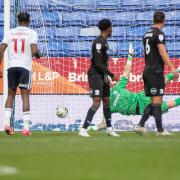 Paul Farman can't save the goal from Aaron Morley that sealed the win for Bolton Wanderers in the Carabao Cup First Round North at the Toughsheet Community Stadium. Picture: Mike Morese | MI News