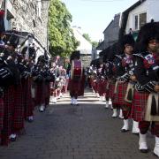 The band processing through Bowness in 2010