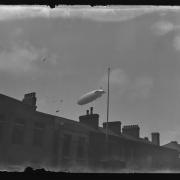The Hindenburg flies over Duke Street, Barrow, so low its Nazi Swastikas are visible