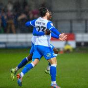 Cole Stockton celebrates his goal against Salford City