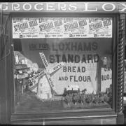 Loxhams shop window advertising Standard Bread and Flour in 1910