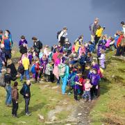 The school kids and staff at the top of Loughrigg