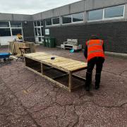 New urban garden area being built in courtyard of community centre