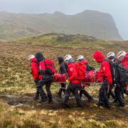 Mountain rescue teams co-ordinate to help man with injured knee