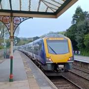 The first train from Lancaster to Barrow leaving Grange station