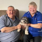 Jeffrey Chelton, his dog Lucy, and his carer Kath Fegan