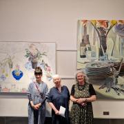 (L-R) Tina Balmer, Mary Gavagan & Rebecca Scott with artwork at Low Wood Bay