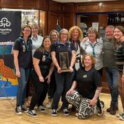 Vicki Boggon from Every Life Matters with Heather’s mum, dad, sister and sister in law as well as other members of the Girlguiding South Cumbria Team being presented with the Flamingo Award.