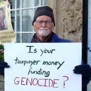 One of the protestors who gather on Saturdays in Kendal