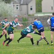 AVAILABLE: Josh Steel (making the tackle) returns for Askam against Leigh East         Picture: Donna Clifford