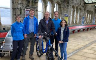 The Morecambe Bay Partnership team with MP for Westmorland and Lonsdale Tim Farron at Grange Station