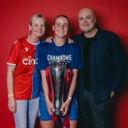 Aimee Everett with the trophy after Crystal Palace were promoted to the top