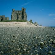 The castle is on an island in the Walney Channel