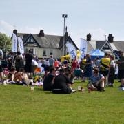 Crowds enjoying the sunshine at Hawcoat Park