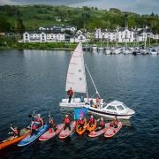 The Low Wood Bay team celebrates the 40th anniversary of its Watersports Centre