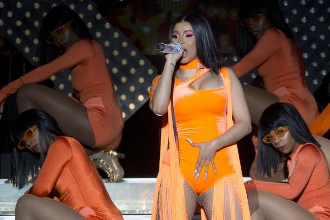 Image result for Cardi B 'begs' for her wig she threw to a crowd during performance (video)