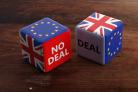 Brexit, deal or no deal concept. United Kingdom and European Union flags on dice, wooden background, banner, copy space. 3d illustration.