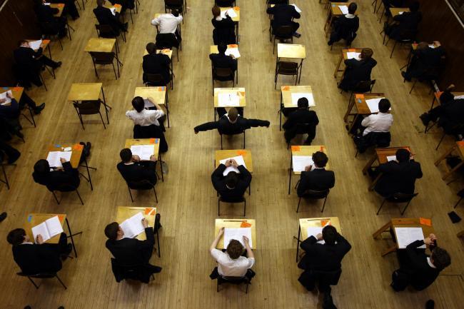 SCHOOLS: Pupils taking an exam