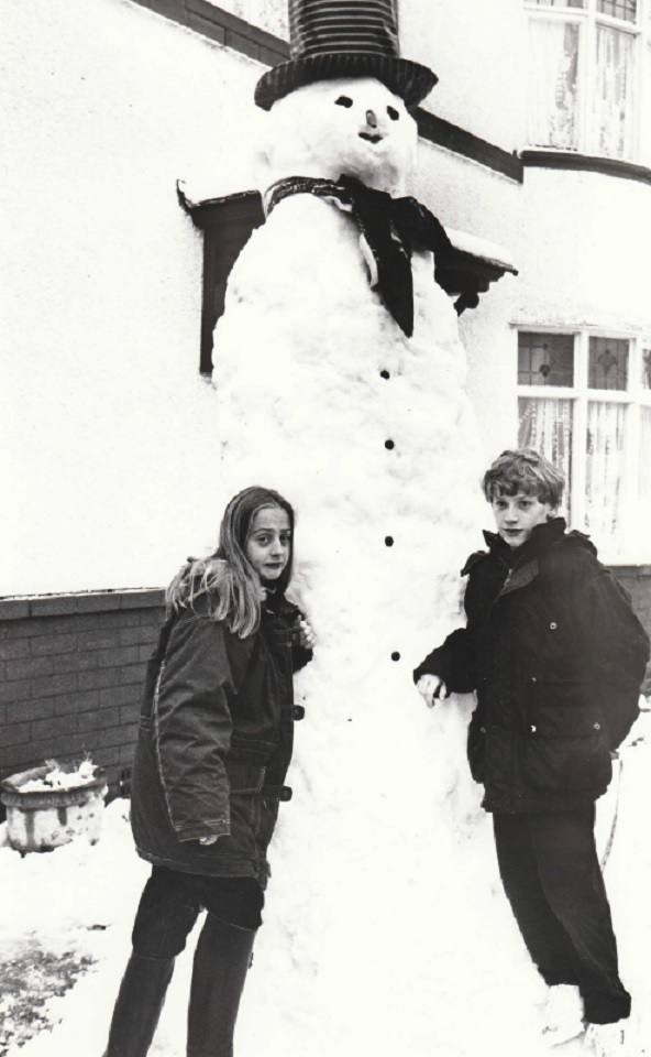 BUILT: Two youngsters with a giant snowman in February 1994
