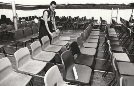 ARRANGING: Kelsang Dekyong helps put out some of the seats to accommodate the visitors at the festival in 1994