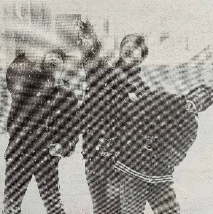 THROW: Barrow boys Ian Bland, 12, Graham Shaw, 14, and Nicholas Beach, 11, having fun in the snow