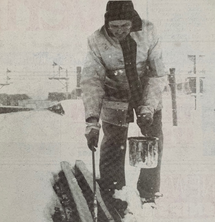SWEEP: A workman tackles frozen points at Barrow on February 6, 1996