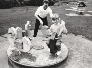 PLAYING: Sarah, aged six, and her father Gary Pendleton, of Newbarns, in Barrow Park in 1994