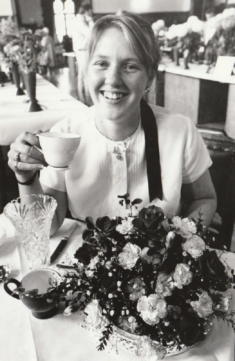 CHEERS: Linda Rollinson, first prize winner in floral art for table decoration at Barrow Horticultural Society Show in 1989