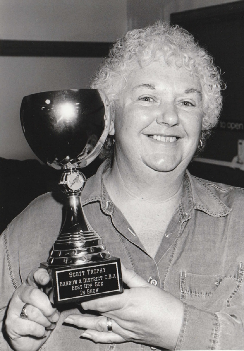 SMILES: Anne Wall, of Walney, with her award for the best opposite sex in show in 1995