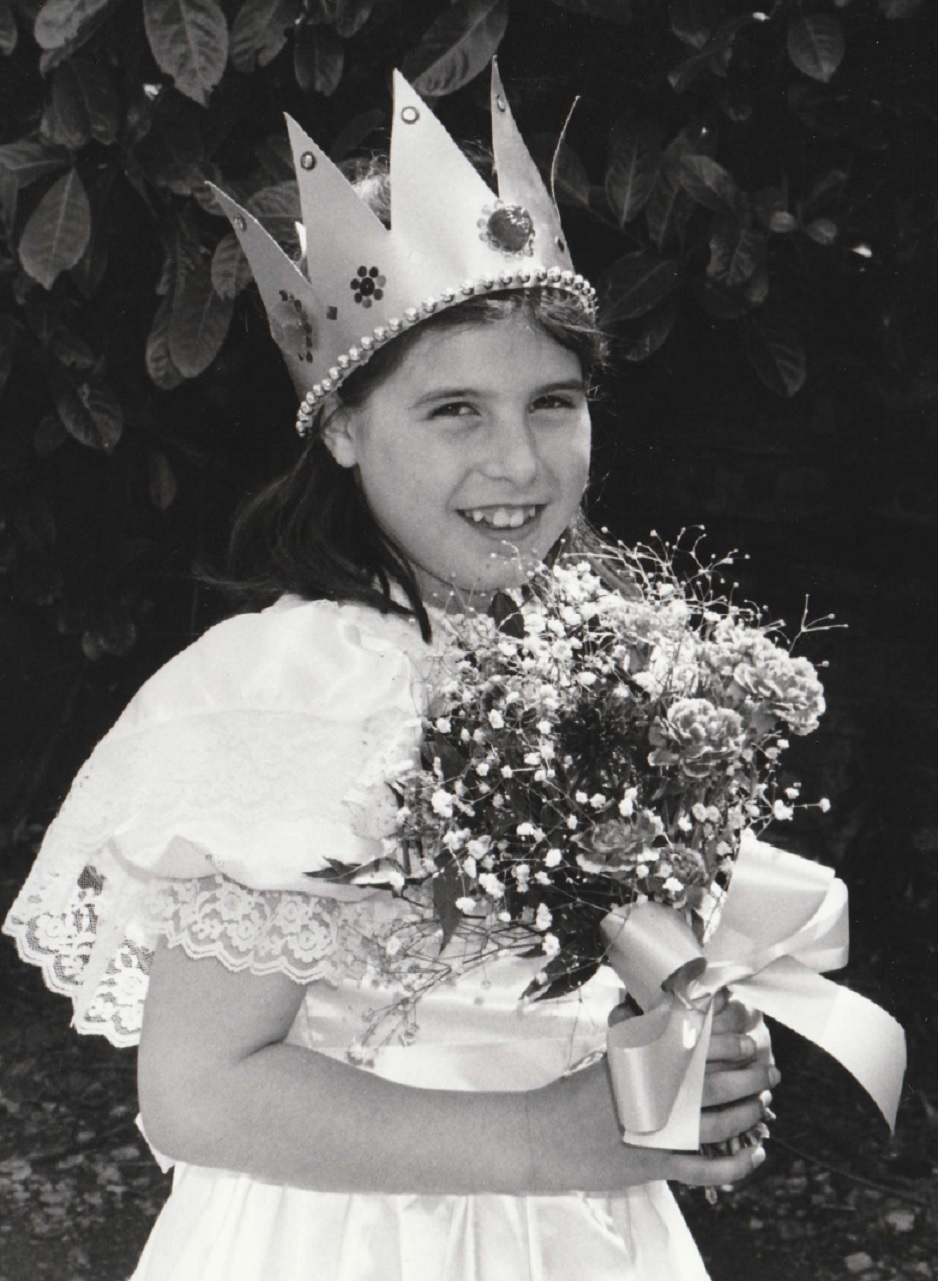 HAIL: Queen of the May: Holly, aged nine, of Coniston Primary School, in 1995