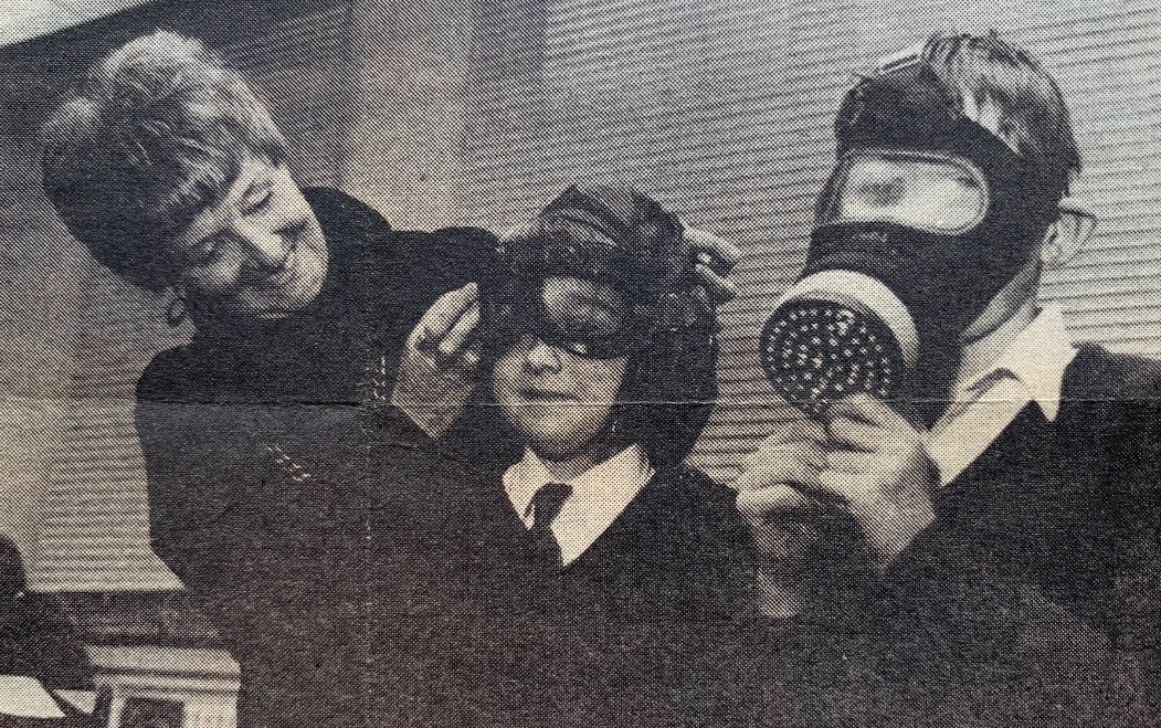 HISTORY: Furness historian and writer Alice Leach shows Walney pupils Cole Martin and Barry Nugent some items used by children during World War Two during a literary fortnight at the school in 1993