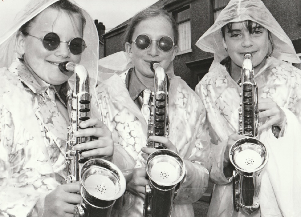 PLAYING: From left, Ashley Metcalf, Aimee Coulson and Laura Atkinson of the Imperial School of Dancing at Dalton Carnival in 1997