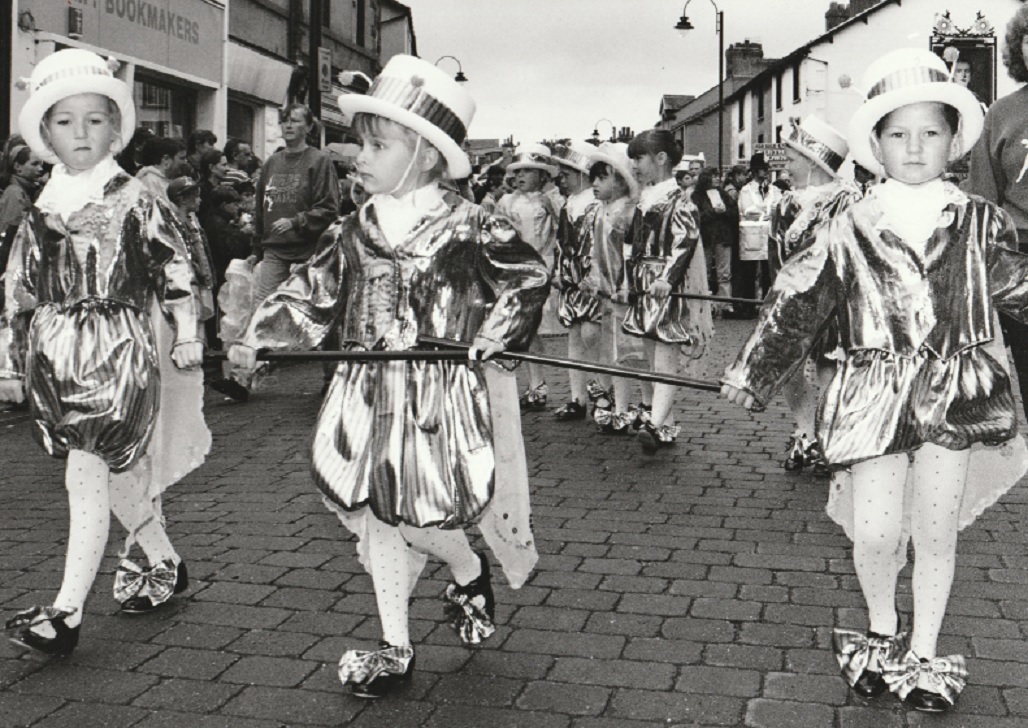 MARCHING: Three youngsters from the What’s Bugging You ensemble at Dalton Carnival in 1997