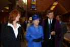 IN COUNTY: The Queen at an exhibition at Tullie House with Joanne Orr and Mike Mitchelson